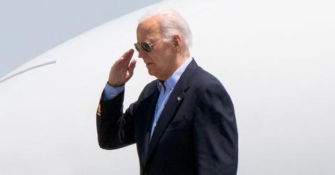 Photo of President Joe Biden saluting.