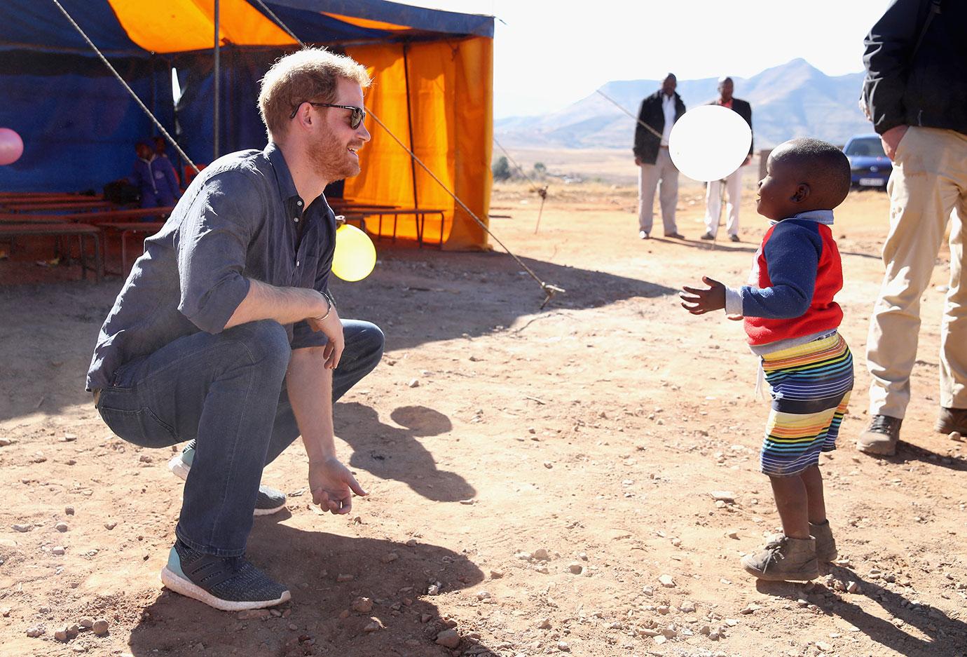 Prince Harry Plays With Children