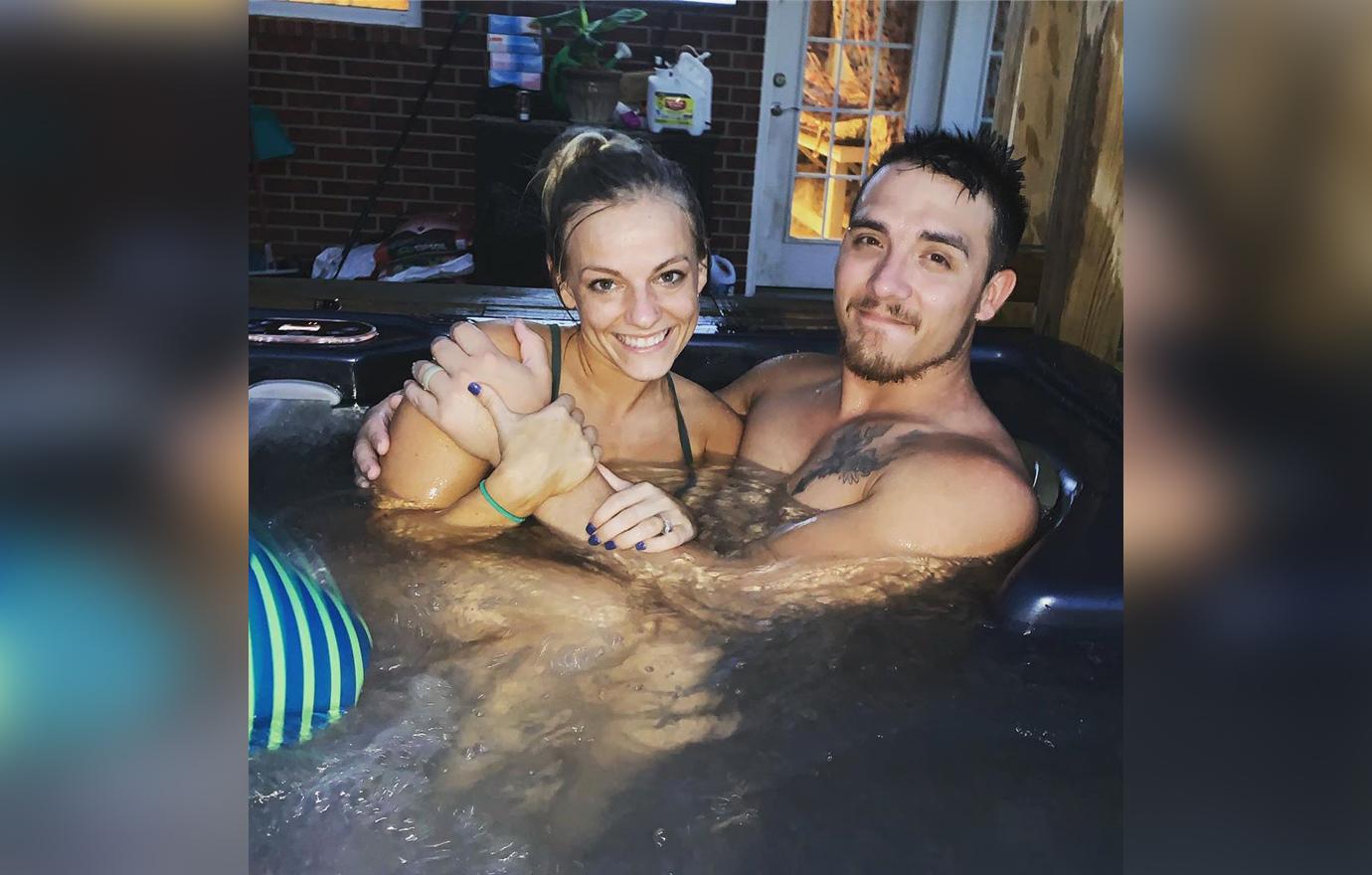 Mackenzie McKee and Josh Pose Holding Each Other in Jacuzzi