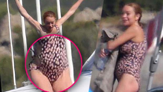 lindsay lohan pregnant bathing suit baby bump italy yacht pics