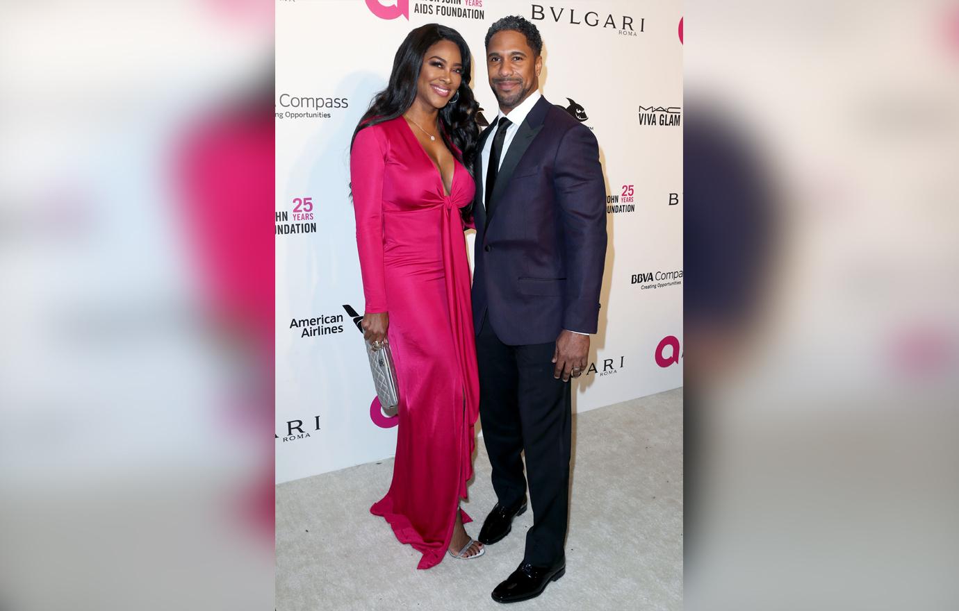 Kenya Moore and Marc Daly attend Elton John AIDS Foundation Academy Awards.