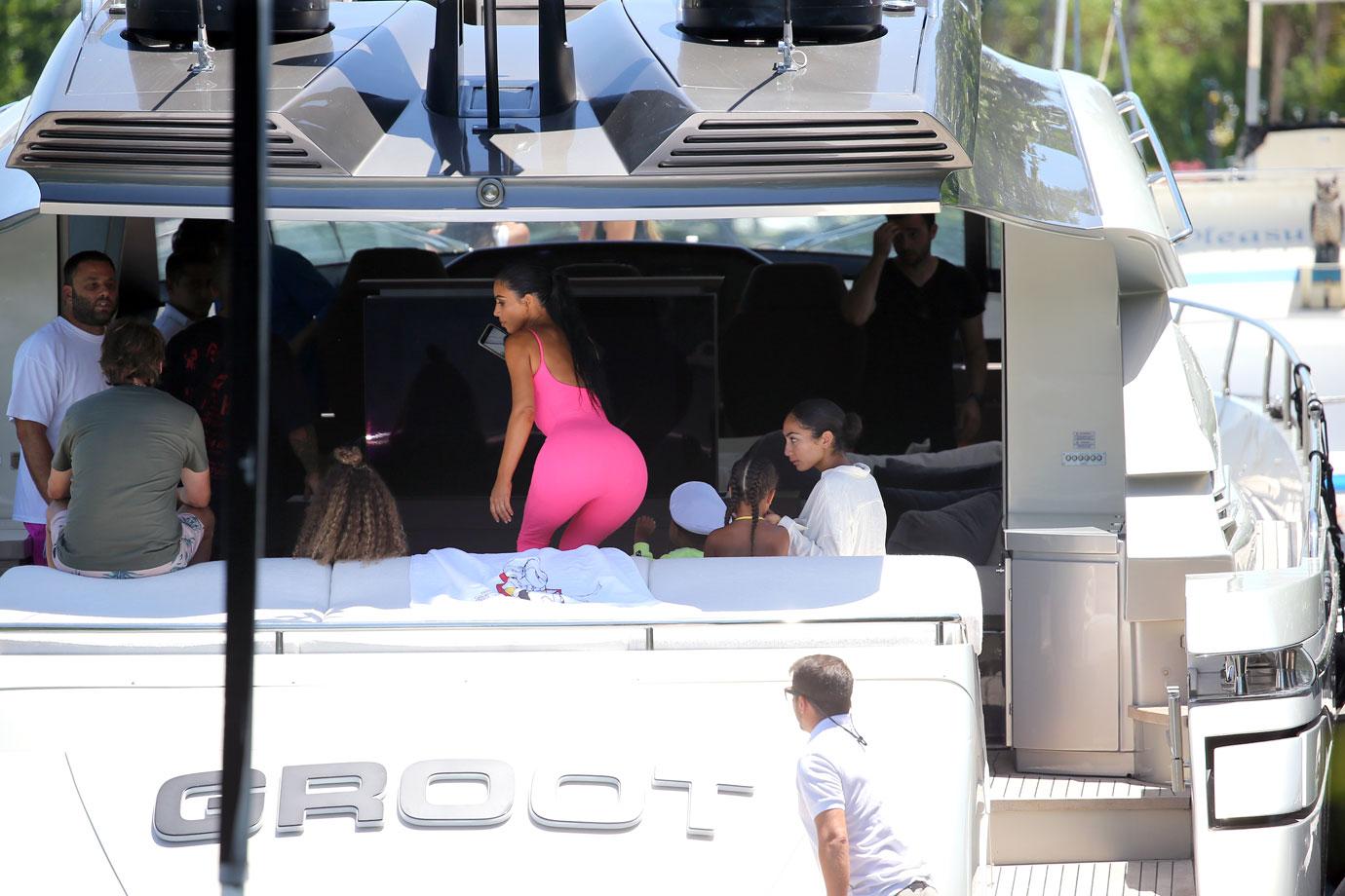 Kim Kardashian Shows Off Curves In Pink Bodysuit