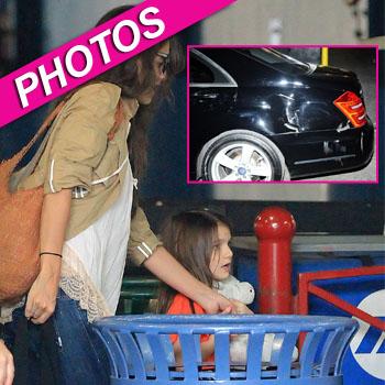 //katie holmes suri car accident pcn sn