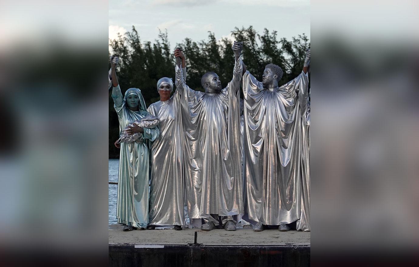 Kanye West Wears Silver Body Paint & Robe For Miami Opera