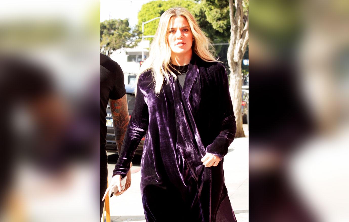 //khloe kardashian baby bump pregnant hiding belly