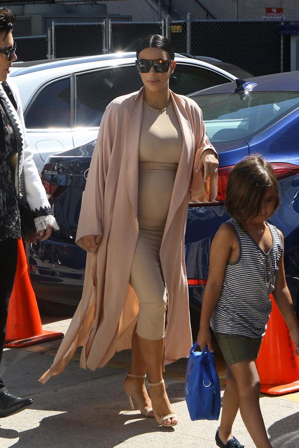 kim kardashian pregnant bump changing