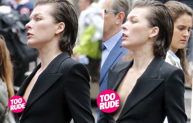Milla Jovovich had a major wardrobe malfunction with a nip slip under her b...