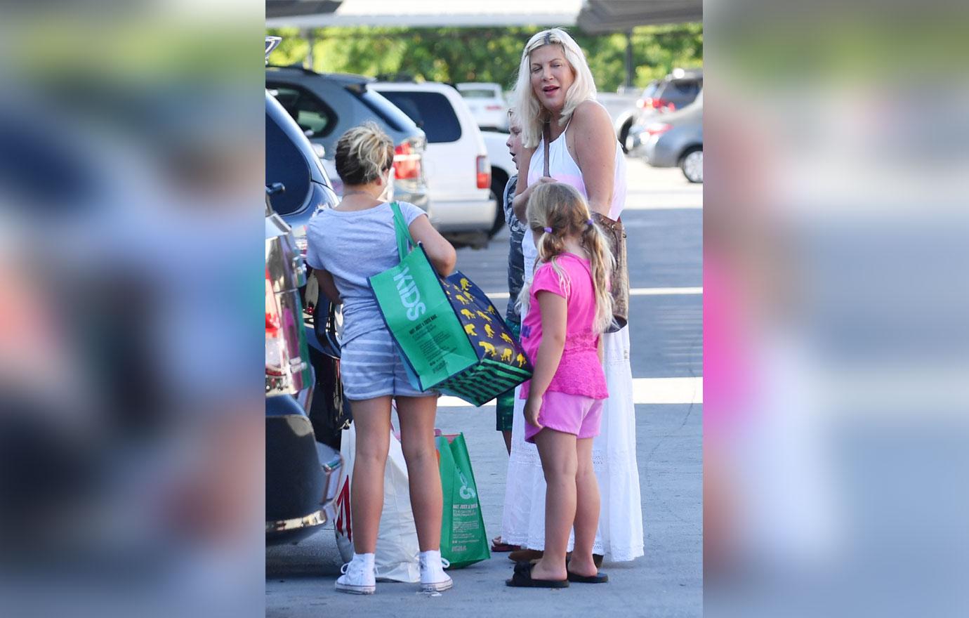 Tori spelling shops target money problems