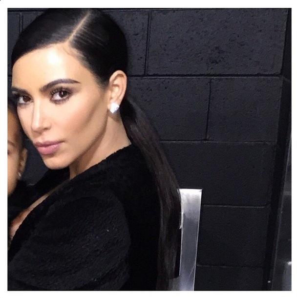 //kim kardashian smiling wrinkles serious pics