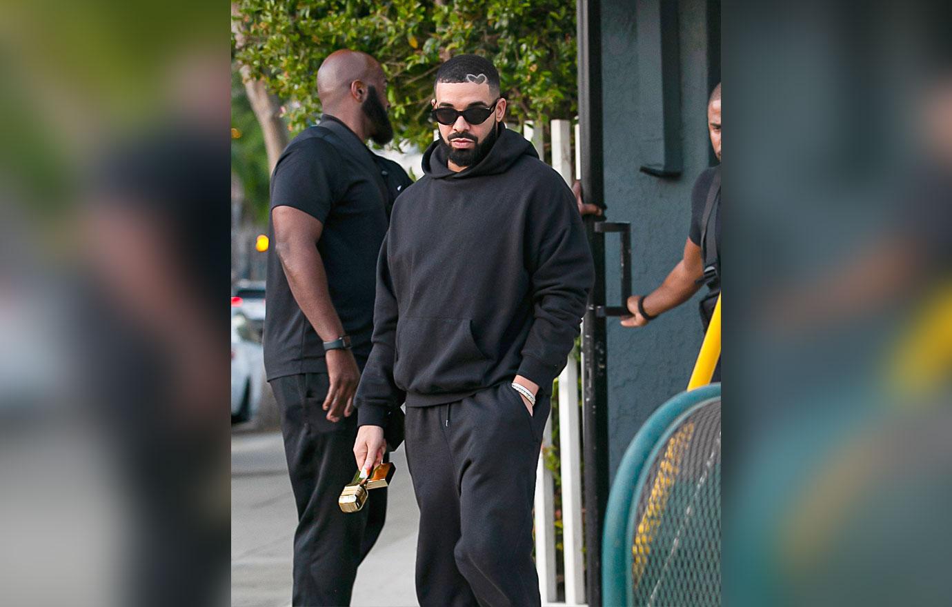 Drake Spotted Walking Around Streets Of LA Holding His Billboard Artist ...
