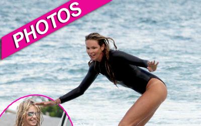 //elle mac surfing getty post