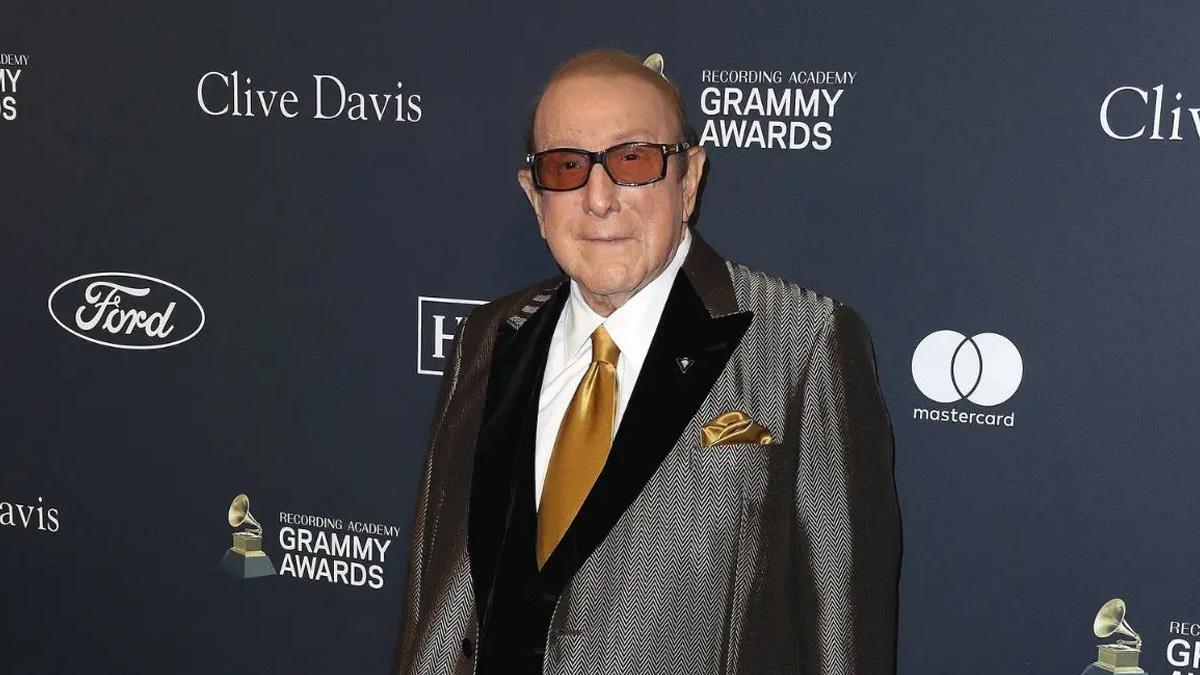 Clive Davis and Greg Schriefer were together for 21 years.