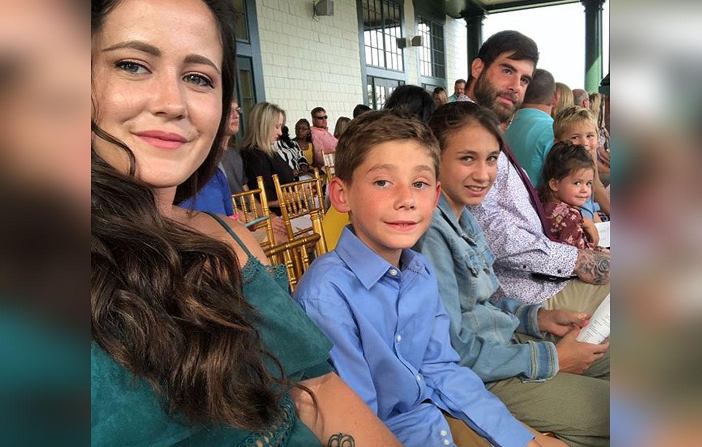 Jenelle Evans poses for a photo with David Eason and her children.