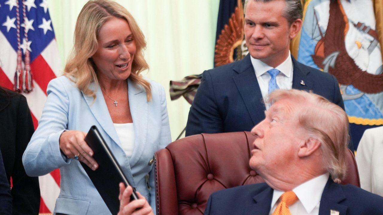 Photo of Donald Trump with Pete and Jennifer Hegseth