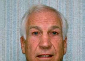 //jerry sandusky lawyer charges dropped