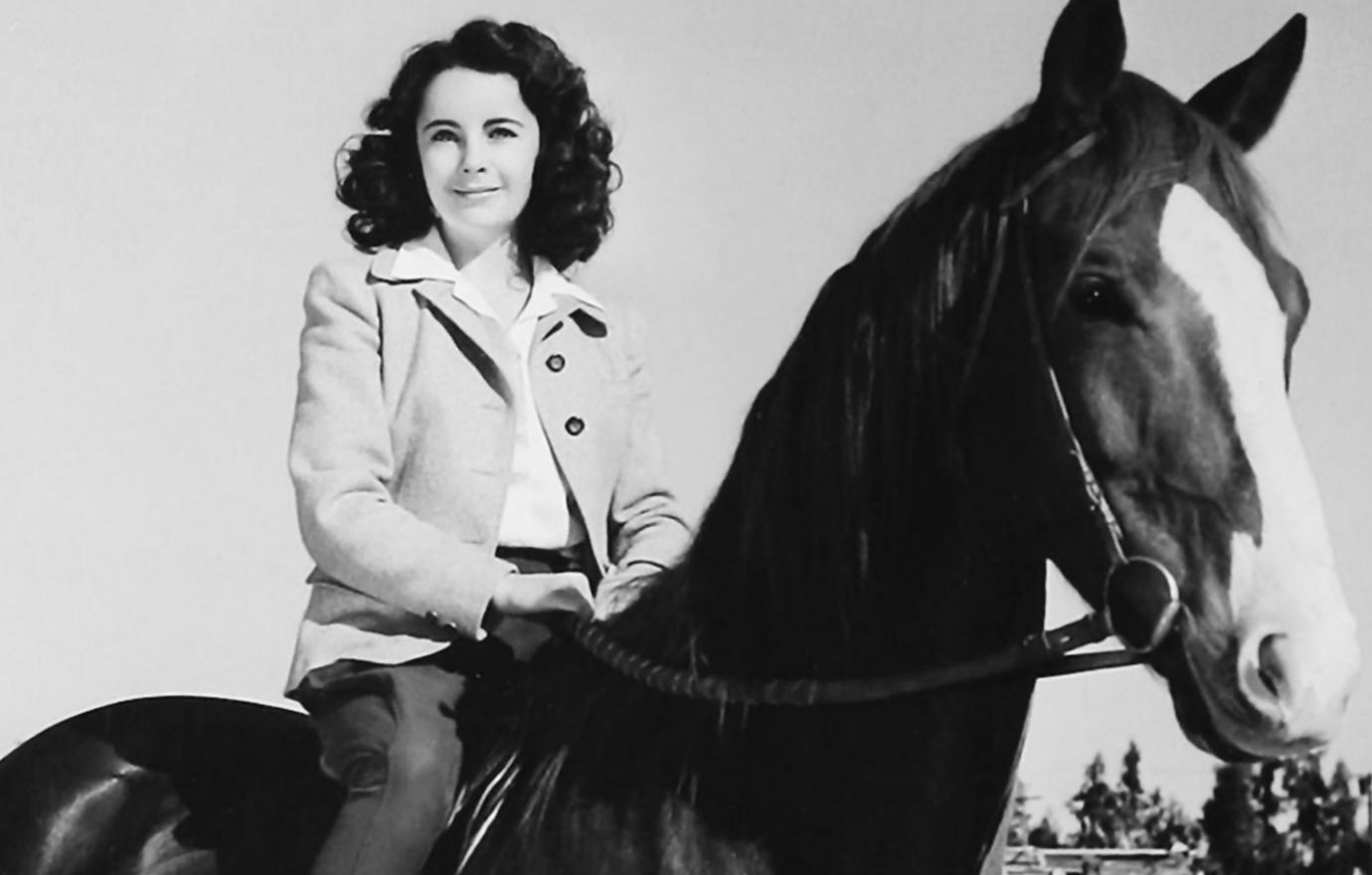 Elizabeth Taylor was seen riding her favorite horse in a movie still from the 1945 classic National Velvet.