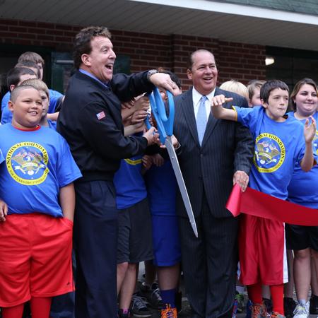 //ribbon cutting jake and gov tomblin