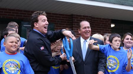 //ribbon cutting jake and gov tomblin