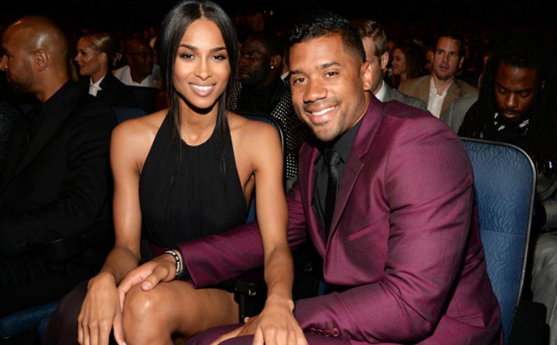 Ciara and Russel Wilson smile for a photo.