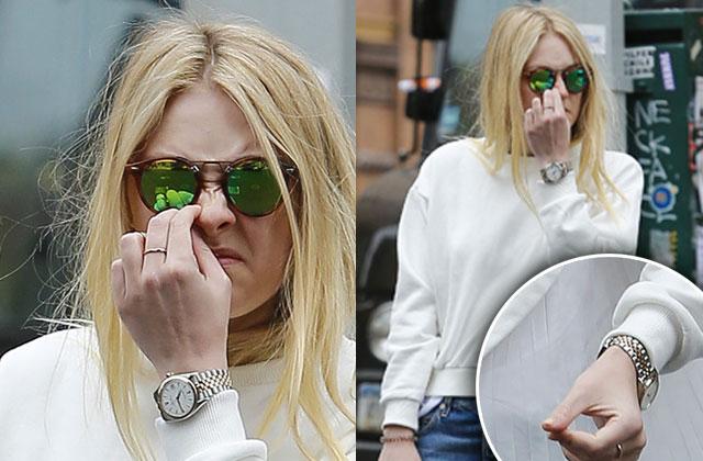 dakota fanning picking nose nyc