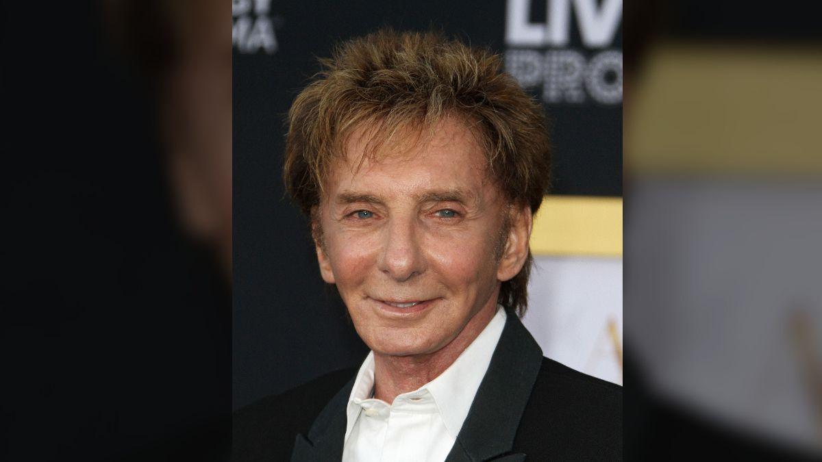 Manilow said a 'very depressing visit' with his surgeon forced him to reschedule early arena dates.