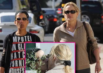 //sharon stone kissing woman splash