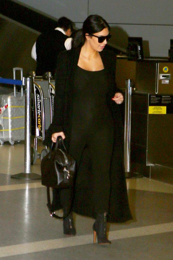 kim kardashian pregnant bump changing