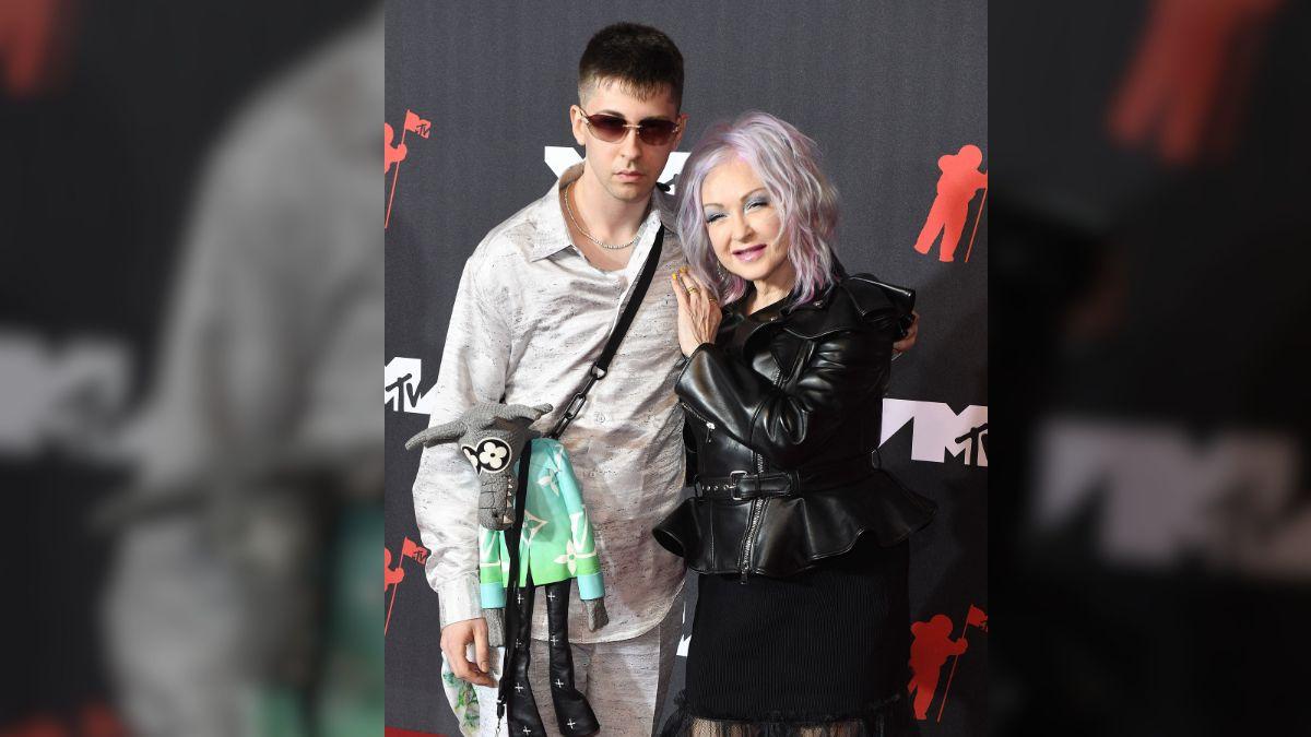 Cyndi Lauper's kid has gotten probation for gun charges as the singer performs for police during case.