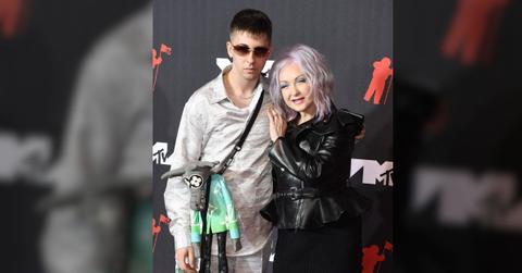 Cyndi Lauper's kid has gotten probation for gun charges as the singer performs for police during case.