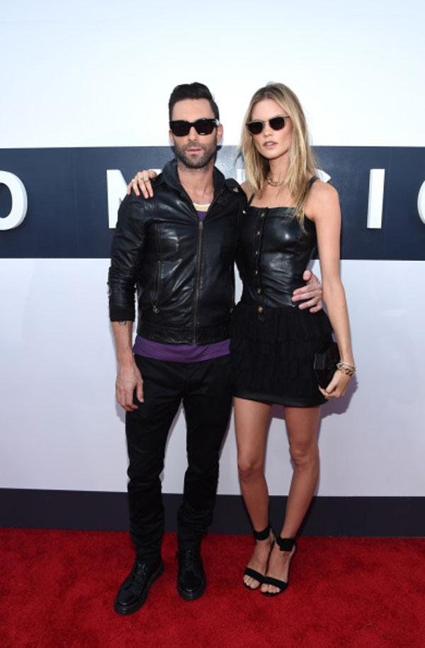 // singer adam levine and model behati prinsloo gettyimages