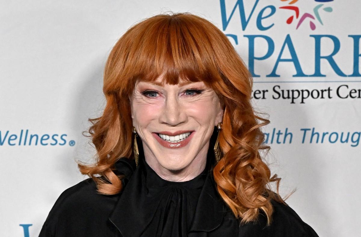 Kathy Griffin sparked online buzz after posting a photo holding hands with a mystery man and writing: 'He's 22.'