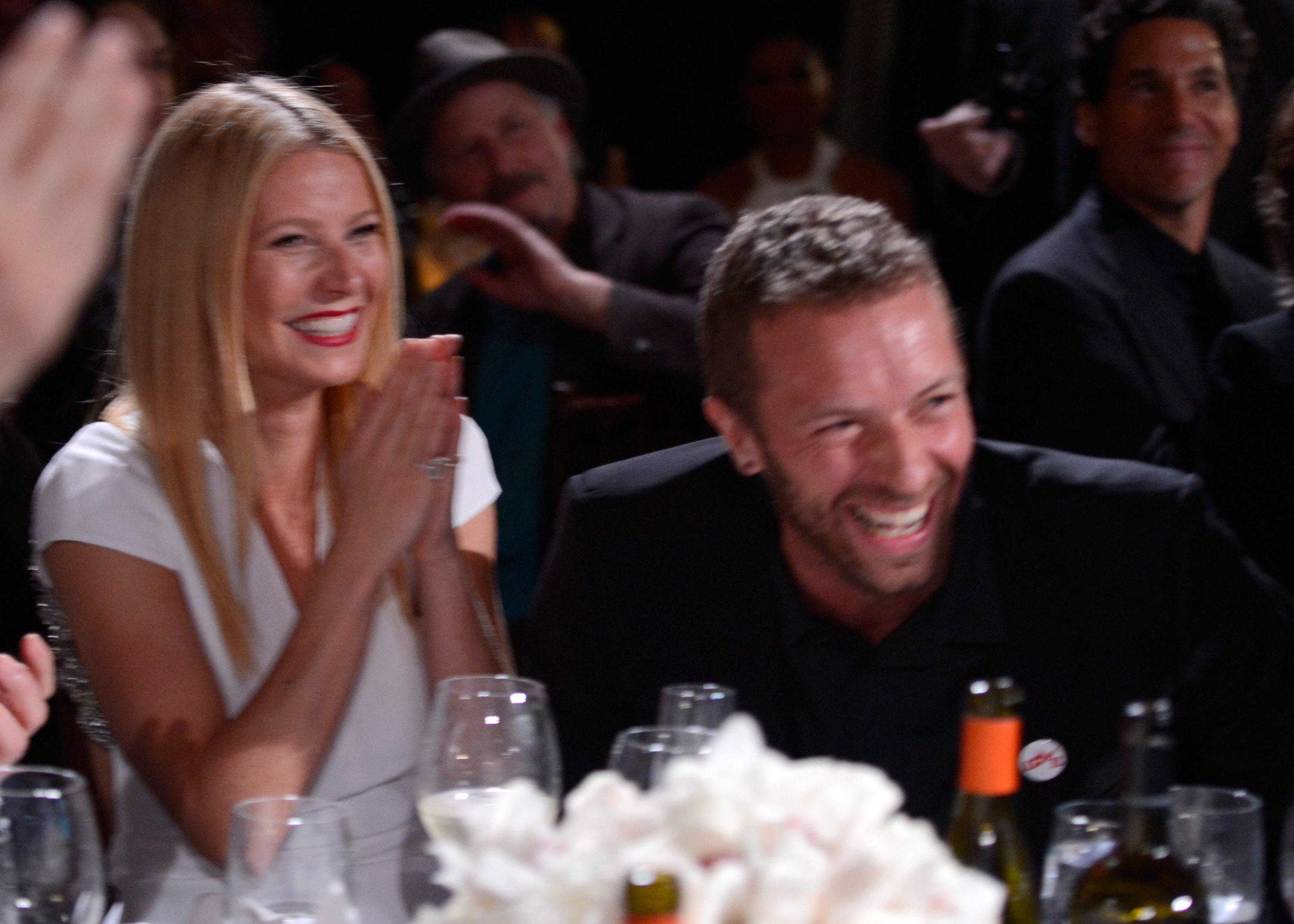 Gwyneth Paltrow Chris Martin Banksy Painting Haiti Gala