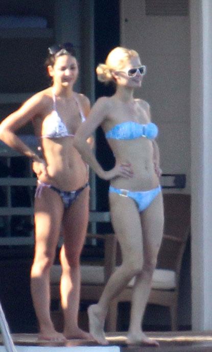 Paris Hilton Shows Off Tan Lines In Thong Bikini (PHOTOS