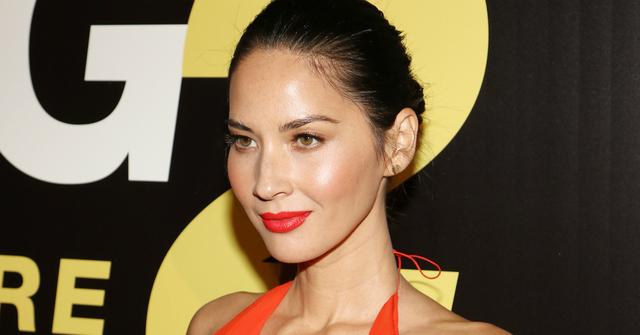 Olivia Munn wore a low cut red ruffled dress, red lips and an updo at the Ride Along 2 premiere.