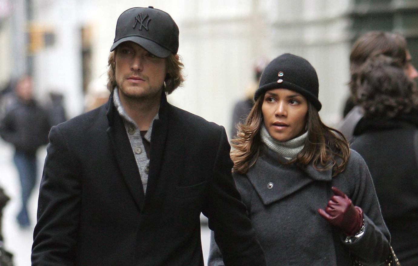 Halle Berry and her boyfriend at the time, Gabriel Aubry, shopped in fall fashion — he in a dark trench coat (and black Yankees hat) and the Oscar winner in a grey coat adorned with the most fashionable of handbags.