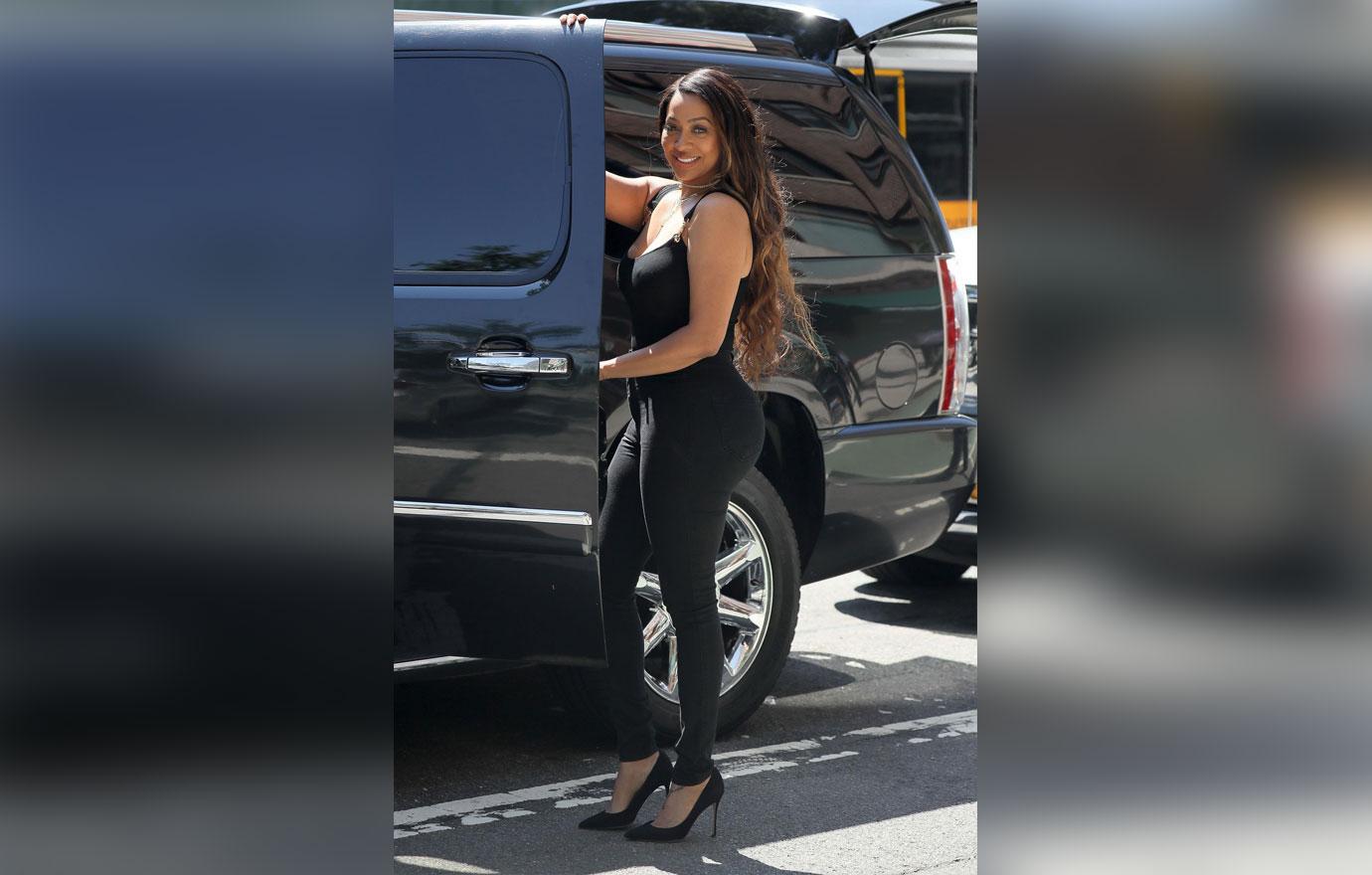 La La Anthony braless sheer top heels