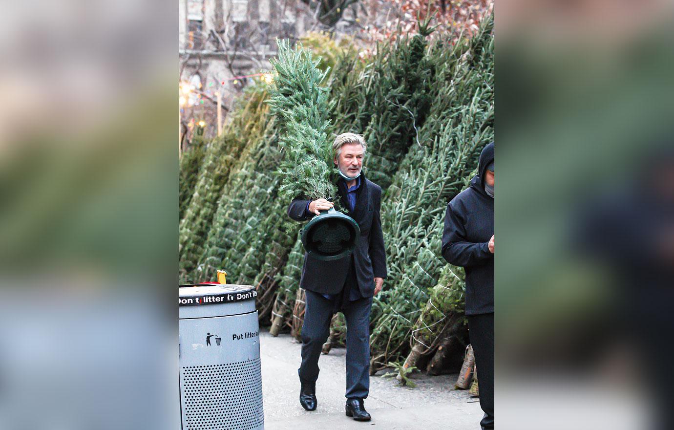 alec baldwin seen out family lunging reporter umbrella poked trigger question r