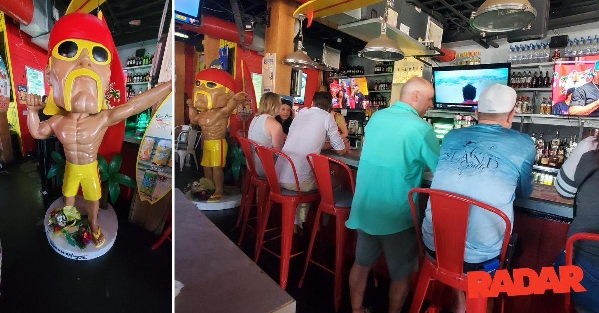 Outside the bar, Hogan's WWE theme song blared from a nearby beachgoer.