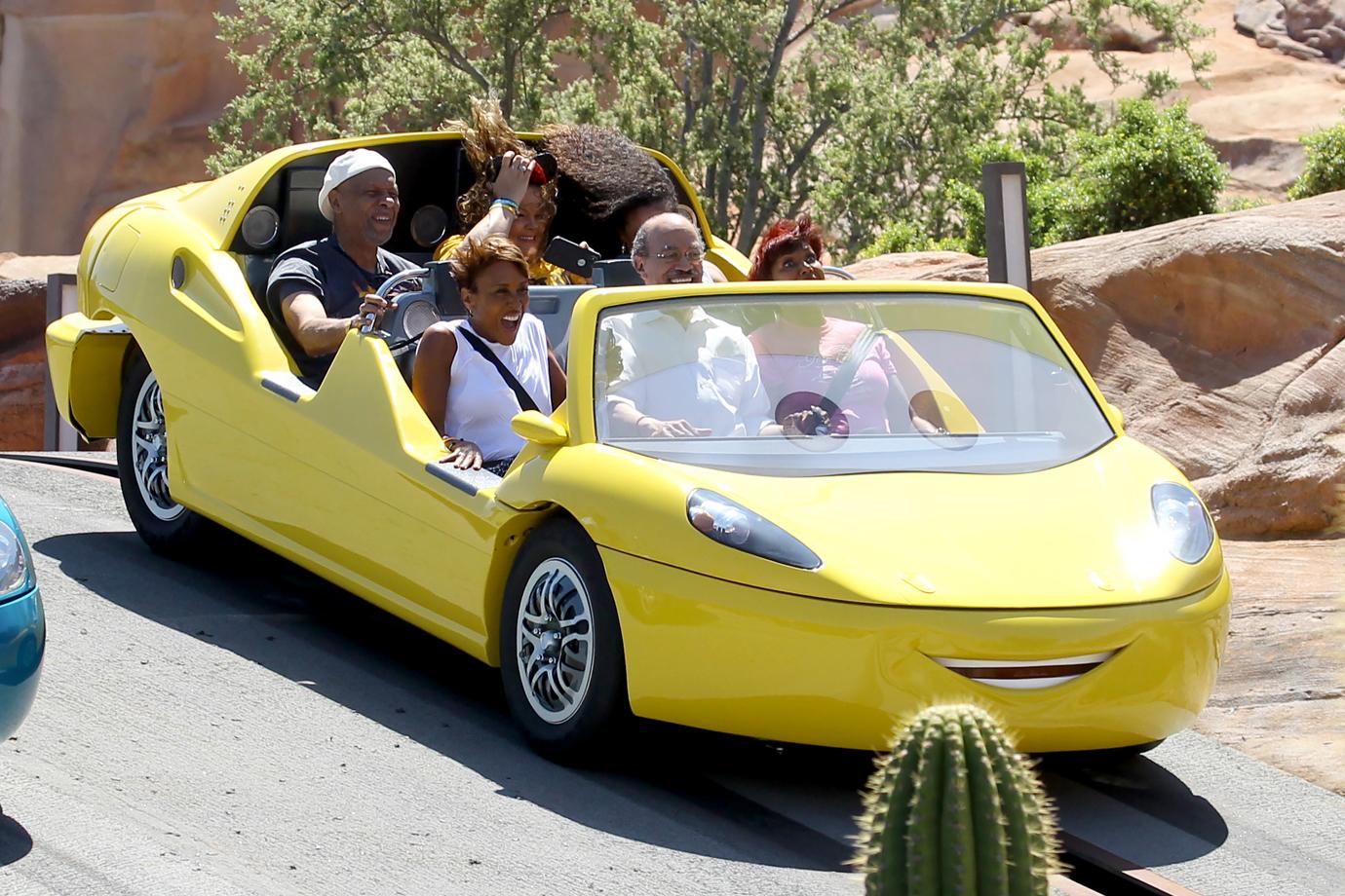 Robin Roberts and her wife Amber Laign have on a day out at Disneyland. Robin was seen riding the radiator springs racers and enjoying lunch at the Carthy Circle restaurant.