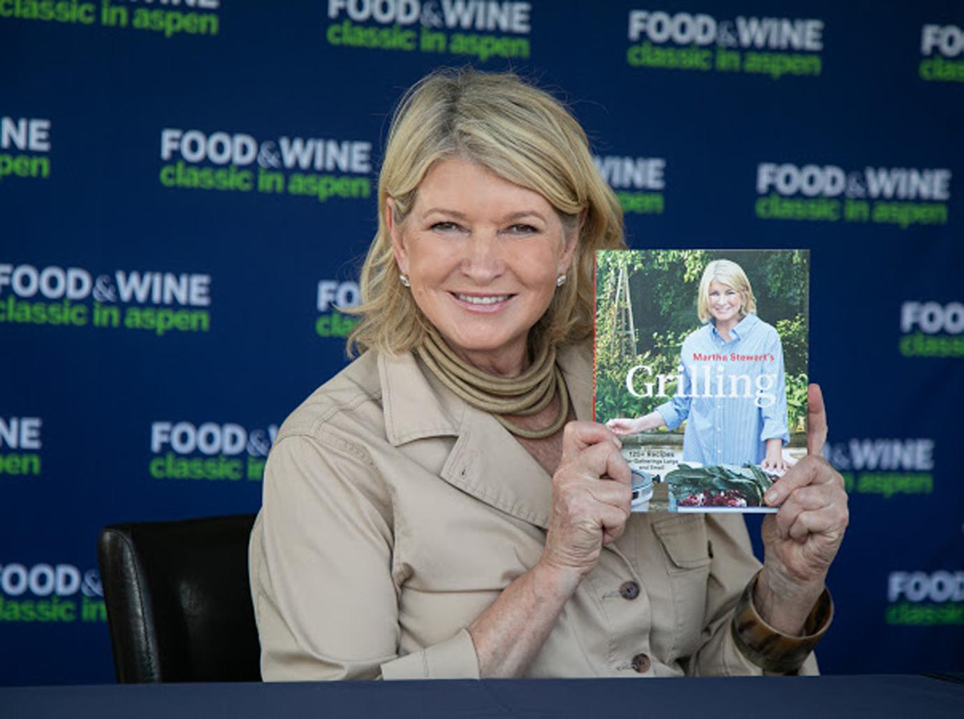 Martha Stewart Holding Grilling Book