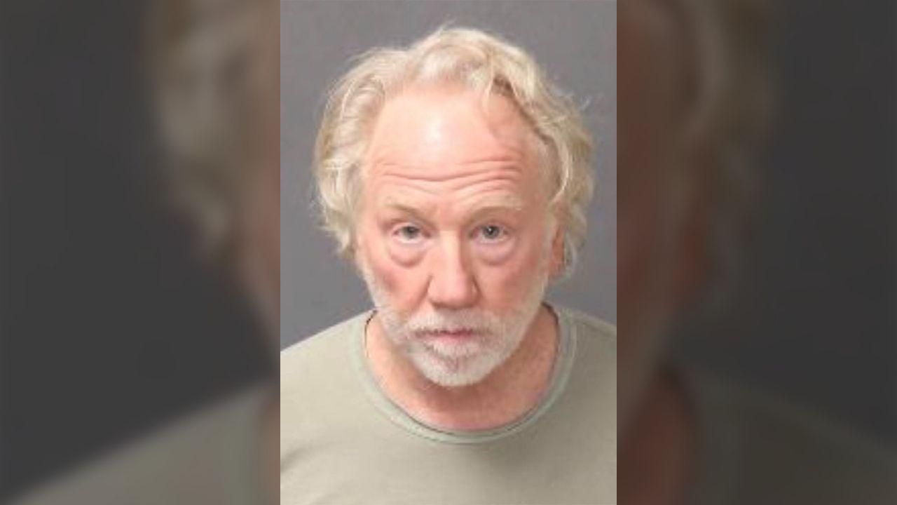 A mugshot of Timothy Busfield