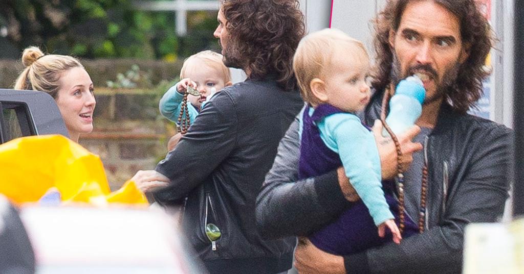Russell Brand Shows Off His Sweet Side Cradles Baby Girl During Family 