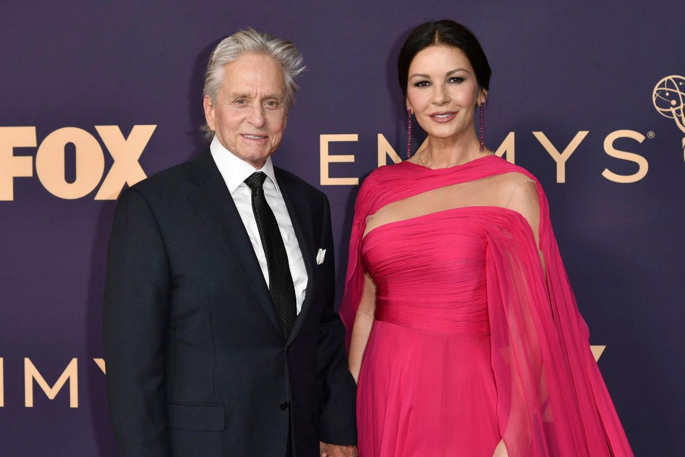 Michael Douglas, left, and Catherine Zeta-Jones arrive at the 71st Primetime Emmy Awards.