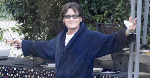 Charlie Sheen wore a blue robe with a white T-shirt underneath as he was seen on the set of the film A Glimpse into the Mind of Charles Swan III.