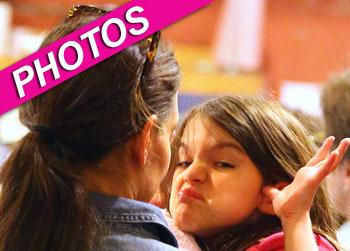 //suri cruise sticks tongue splash