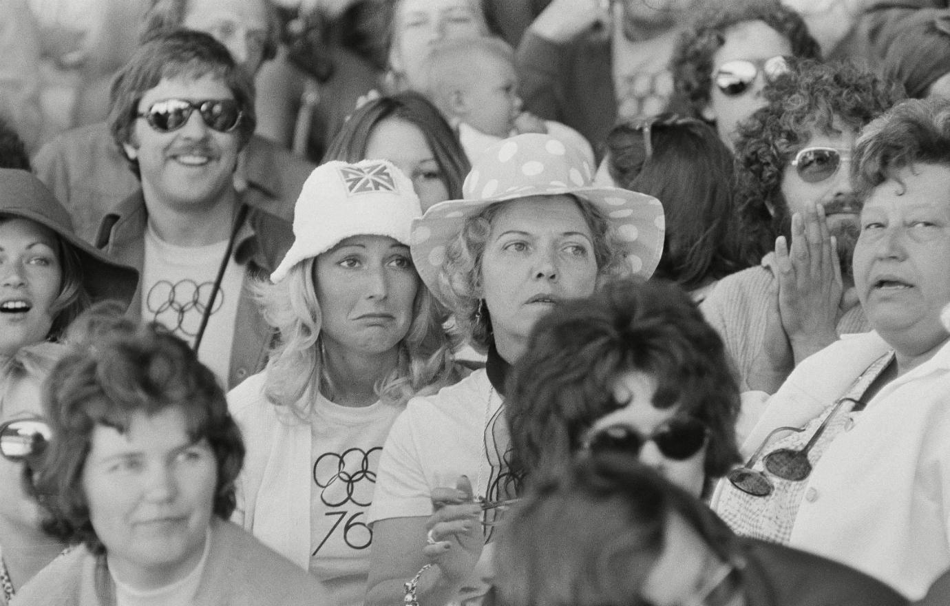 Esther Jenner, in a polka-dot hat, watches from the stands at the US Olympic trials in 1976.