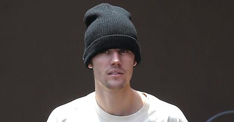 Justin Bieber Wearing Hat and Oversize Smiley Shirt