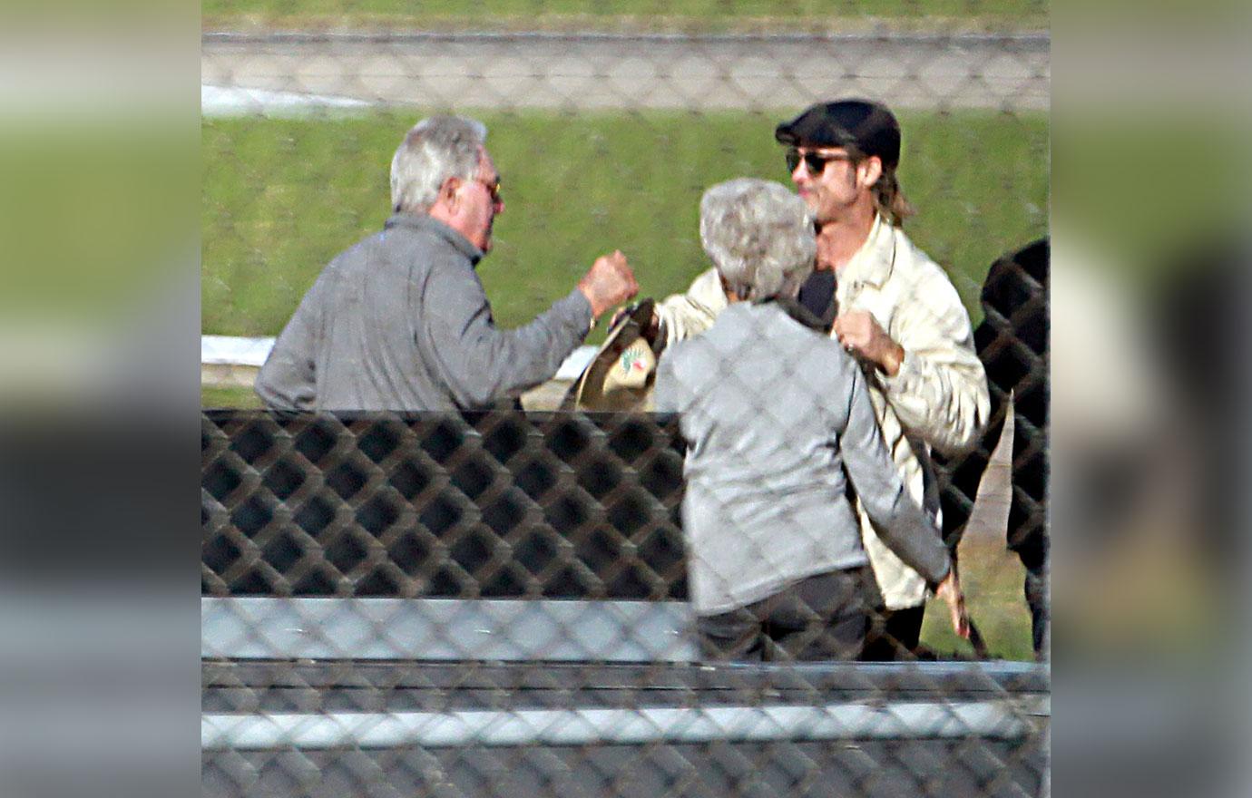 Brad Pitt hugging his parents in Missouri