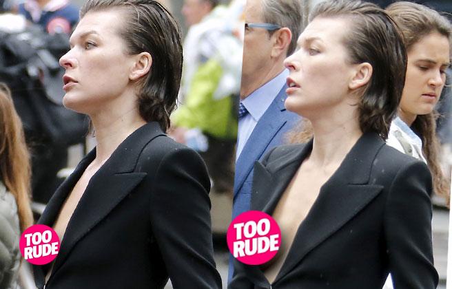 Milla Jovovich Wardrobe Malfunction Nip Slip Vogue