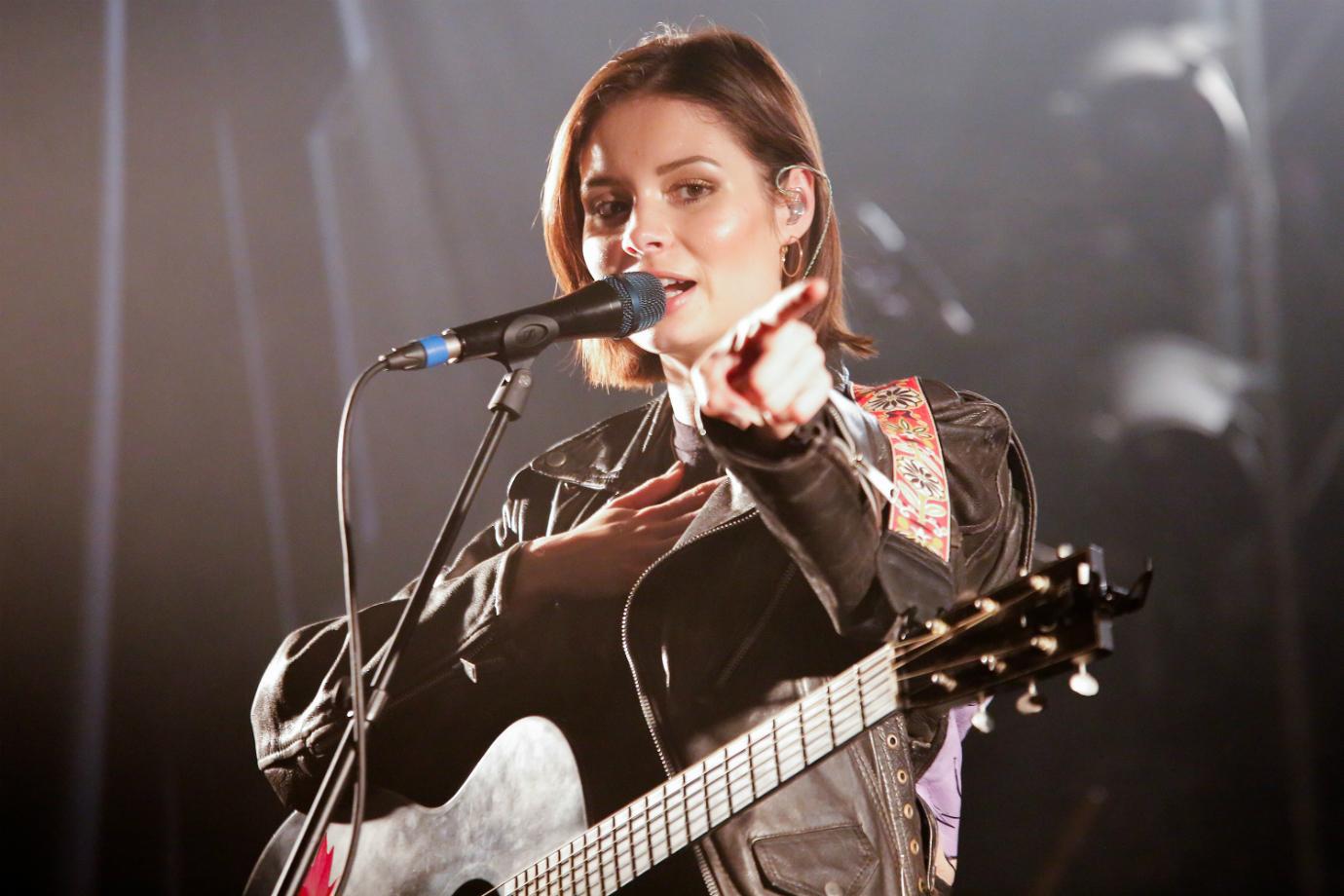 Nina Nesbitt performs on stage.